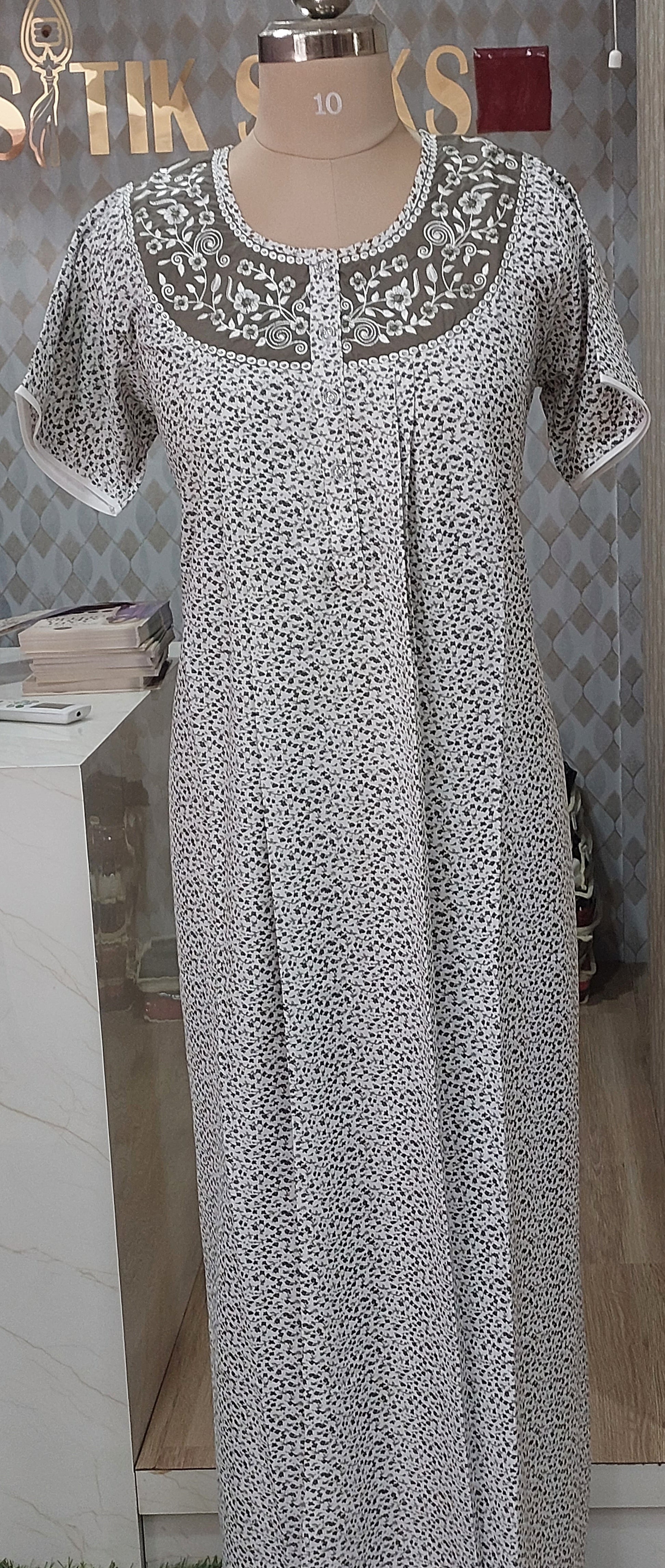 Elegant white cotton nighty