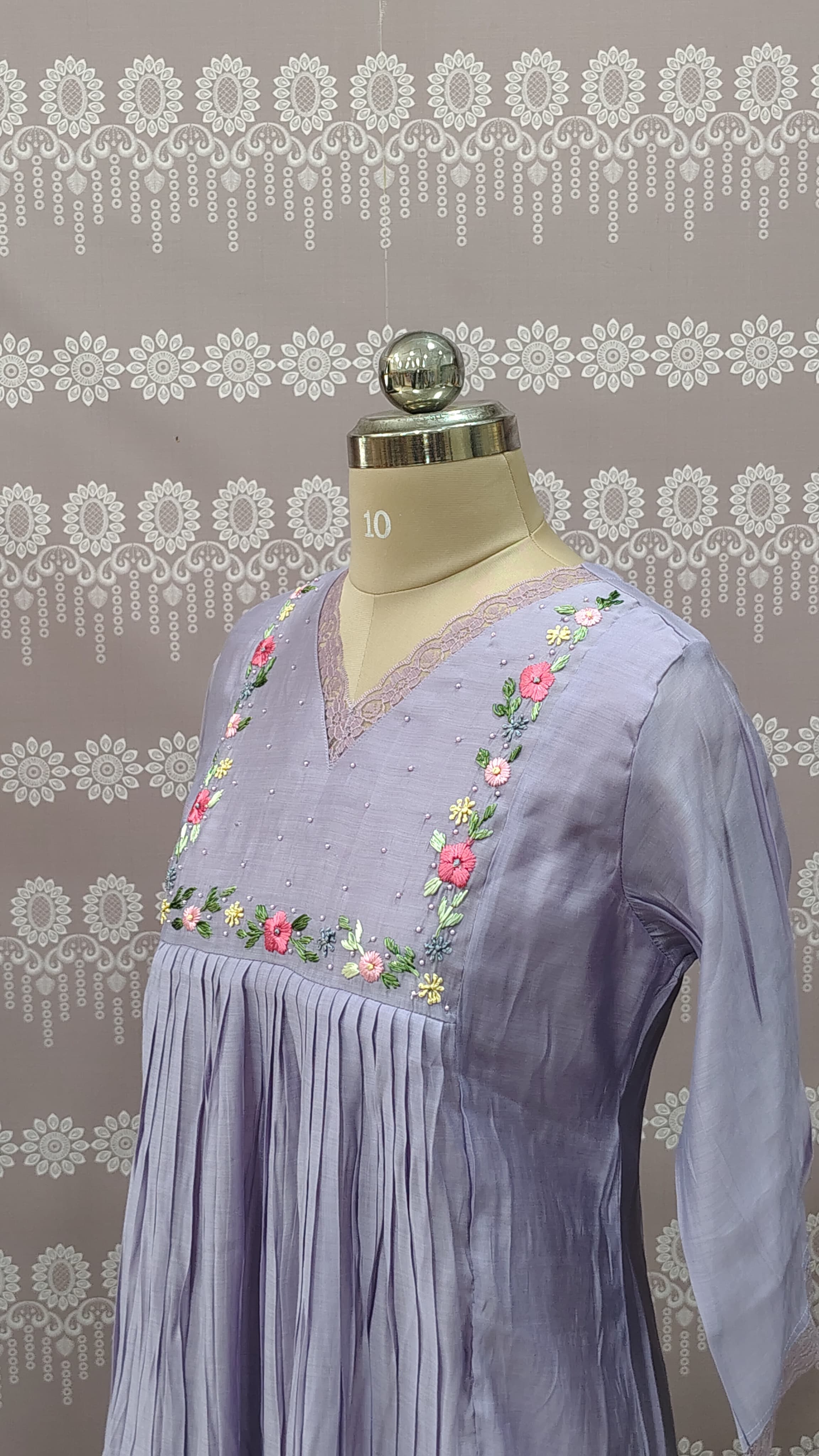 The outfit is a Lilac (Light lavender maxi