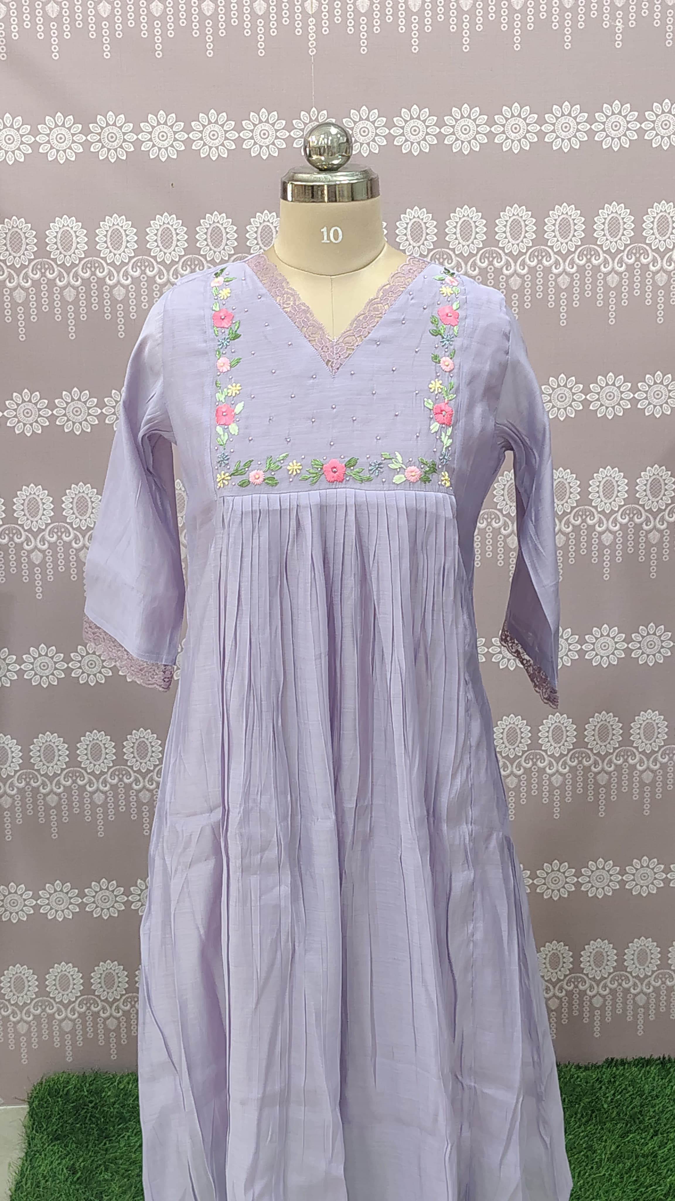 The outfit is a Lilac (Light lavender maxi